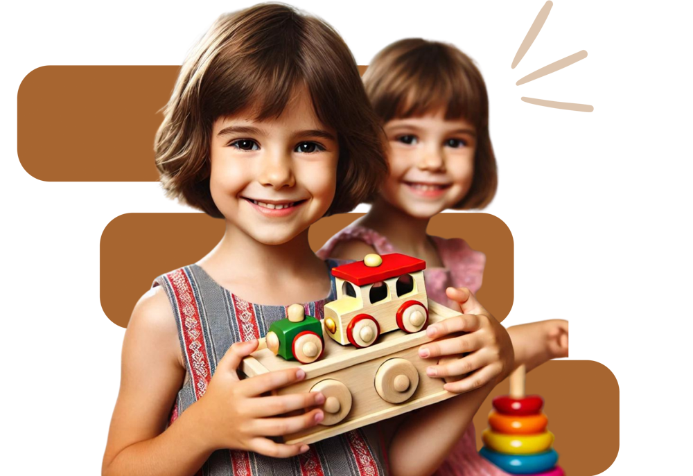 Two young girls smile at the camera; one holds a wooden toy train, while the other stands behind her with colorful stacking rings nearby.